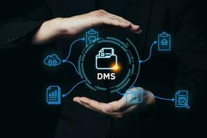 Document Management System DMS concept. Hand pressing file icon Virtual screen automation software to archiving and efficiently manage and information with ERP. Corporate business technology. photo