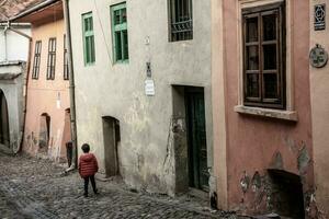 A beautiful medieval citadel city of Sighisoara in the heart of Romania, Transylvania travel destination in Eastern Europe. photo