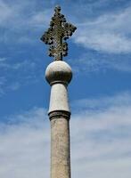 Padova  Italy  August 8, 2022 Stone cross near the Basilica of Saint Anthony. Padua, Italy photo