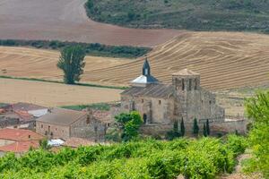 Romanesque catholic church in small village in the countrysidea photo