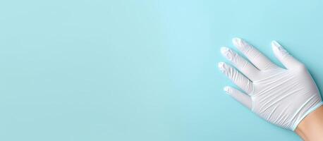 A pair of white gloves on a blue background created with technology photo