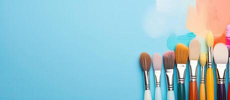 A group of paint brushes sitting next to each other created with technology photo