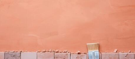 A paintbrush sitting on top of a brick wall created with technology photo