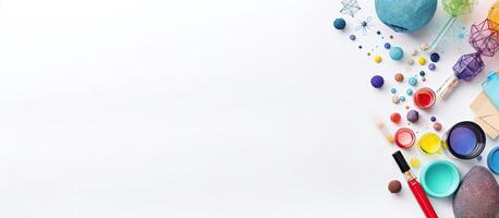 A white table topped with lots of different colored paints created with technology photo