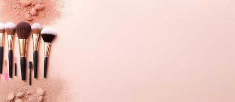 A set of makeup brushes and powder on a pink background created with technology photo