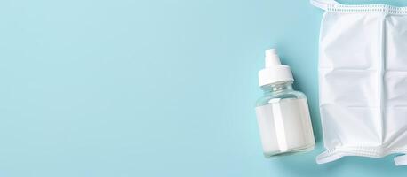 A bottle of liquid next to a bag on a blue background created with technology photo