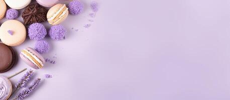 A purple background with macaroons and lavender flowers created with technology photo