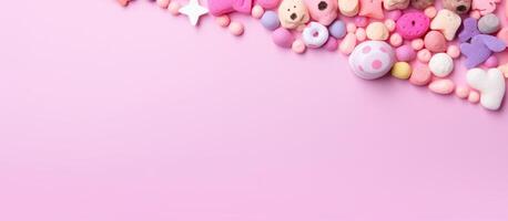 A pink background with a lot of small toys created with technology photo