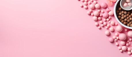 A pink background with a bowl of pink and white candy created with technology photo