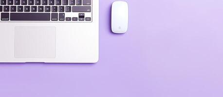 A laptop computer sitting on top of a purple table created with technology photo