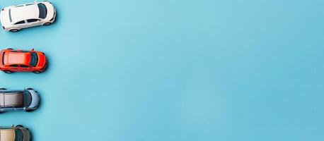 A row of toy cars on a blue background created with technology photo