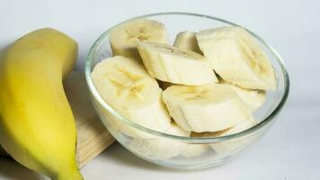 Banana slices in bowl photo