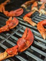 huge lobster claws on grill for dinner and for shrimp boil photo