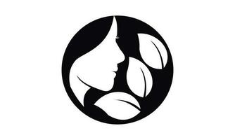 Female face vector illustration logo with leaves as a symbol of beauty salon