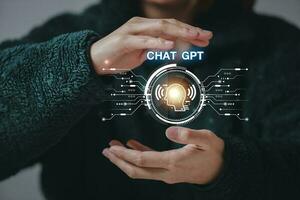 ChatGPT Chat with AI or Artificial Intelligence using an artificial intelligence chatbot developed by OpenAI. photo