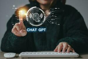 ChatGPT Chat with AI or Artificial Intelligence using an artificial intelligence chatbot developed by OpenAI. photo