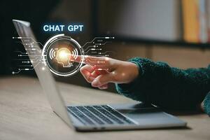 ChatGPT Chat with AI or Artificial Intelligence using an artificial intelligence chatbot developed by OpenAI. photo