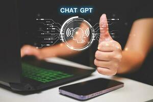 ChatGPT Chat with AI or Artificial Intelligence using an artificial intelligence chatbot developed by OpenAI. photo