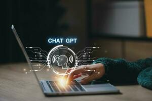 ChatGPT Chat with AI or Artificial Intelligence using an artificial intelligence chatbot developed by OpenAI. photo