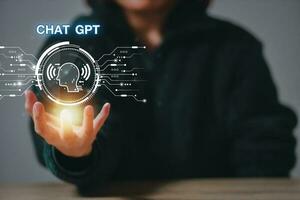 ChatGPT Chat with AI or Artificial Intelligence using an artificial intelligence chatbot developed by OpenAI. photo