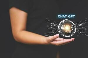 ChatGPT Chat with AI or Artificial Intelligence using an artificial intelligence chatbot developed by OpenAI. photo