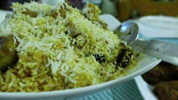 Mutton biryani meal in a bowl on table video
