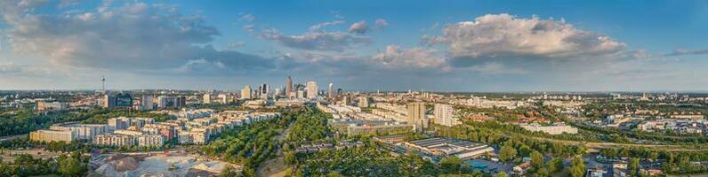 Wide angle drone panorama over the German city Frankfurt am Main during sunset photo