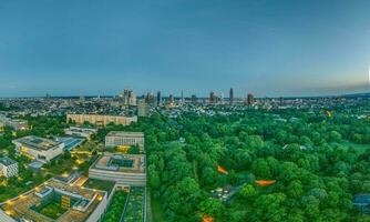 Wide angle drone panorama over the German city Frankfurt am Main during sunset photo