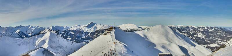 Panoramic view over Kanzelwand cable car mountain station in Austria in winter time photo