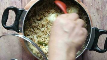 Mutton biryani meal in a bowl on table video