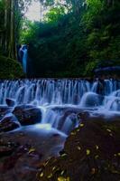 beautiful view of waterfall, water flow in river with waterfall view photo