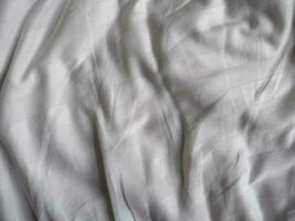 blanco cama sábana algodón tela textura antecedentes foto