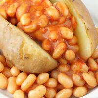 ai generated jacket potato with beans photo