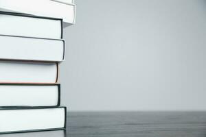 Book stack in the library room and blurred stack book for business and education background, back to school concept. Copy space for text. Distance education, e-learning concept. photo