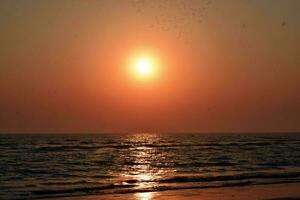 Seaside sunset scene on the beach, summer vacation abstract photo