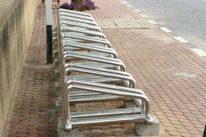 Parking for bicycles in the park photo