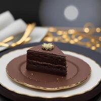 sackertorte. Chocolate cake on a golden plate. Coffee beans on a black textured table. photo