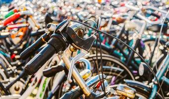 Close-up detail view of old holland vintage classic bicycles parked photo