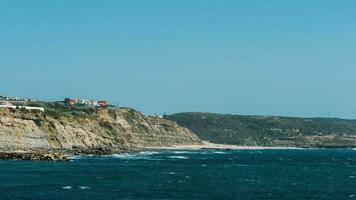 Coastline of Ericiera in Portugal looking southwards towards Sintra and Cascais photo