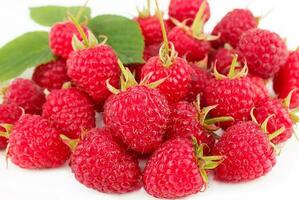 Raspberries close-up on a white background photo