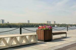 Embankment in river station pier. Starting point of cruise tourism ships. Passenger terminal. Pedestrian park photo