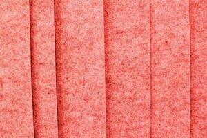 Soft pink stripes felt texture material background. Surface of fabric wool material for handmade creative. Scrapbooking, felting item. Natural rough textile fiber pattern photo
