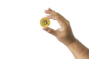 close-up hand of man holding crypto coin copy space isolated on white background. Blockchain technology finance in future. Male hand hold Bitcoin. concept about business, finance, trade, economy. photo