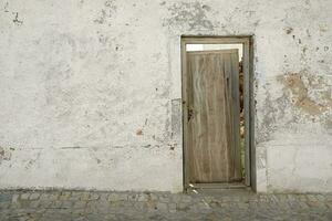 Background with old wooden weathered door photo