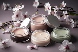 Natural organic eco cosmetics in open jars with blooming cherry flowers, beauty and SPA theme. Cosmetic containers with cream or lotion, natural ingredients, face care concept. image. photo