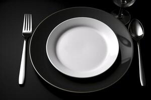 Empty plate with fork and knife on black. Served cutlery, minimal dark table setting. Menu mockup, space for text, diet concept. photo