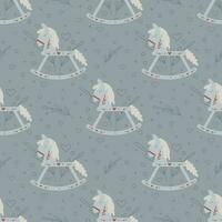 Vector seamless pattern with retro rocking kids toy blue horse with branches and decoration of hearts on a grey background.