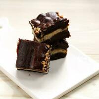 Sliced Brownie Chocolate Cake with Cheese Layer photo