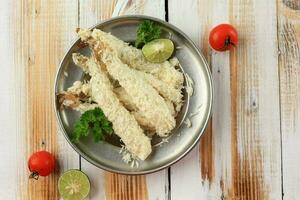 Top View Raw Tempura Shrimps Ebi Furai in Breaded Flour photo