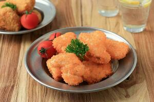 pollo pepita con crujiente burbuja revestimiento miga. foto